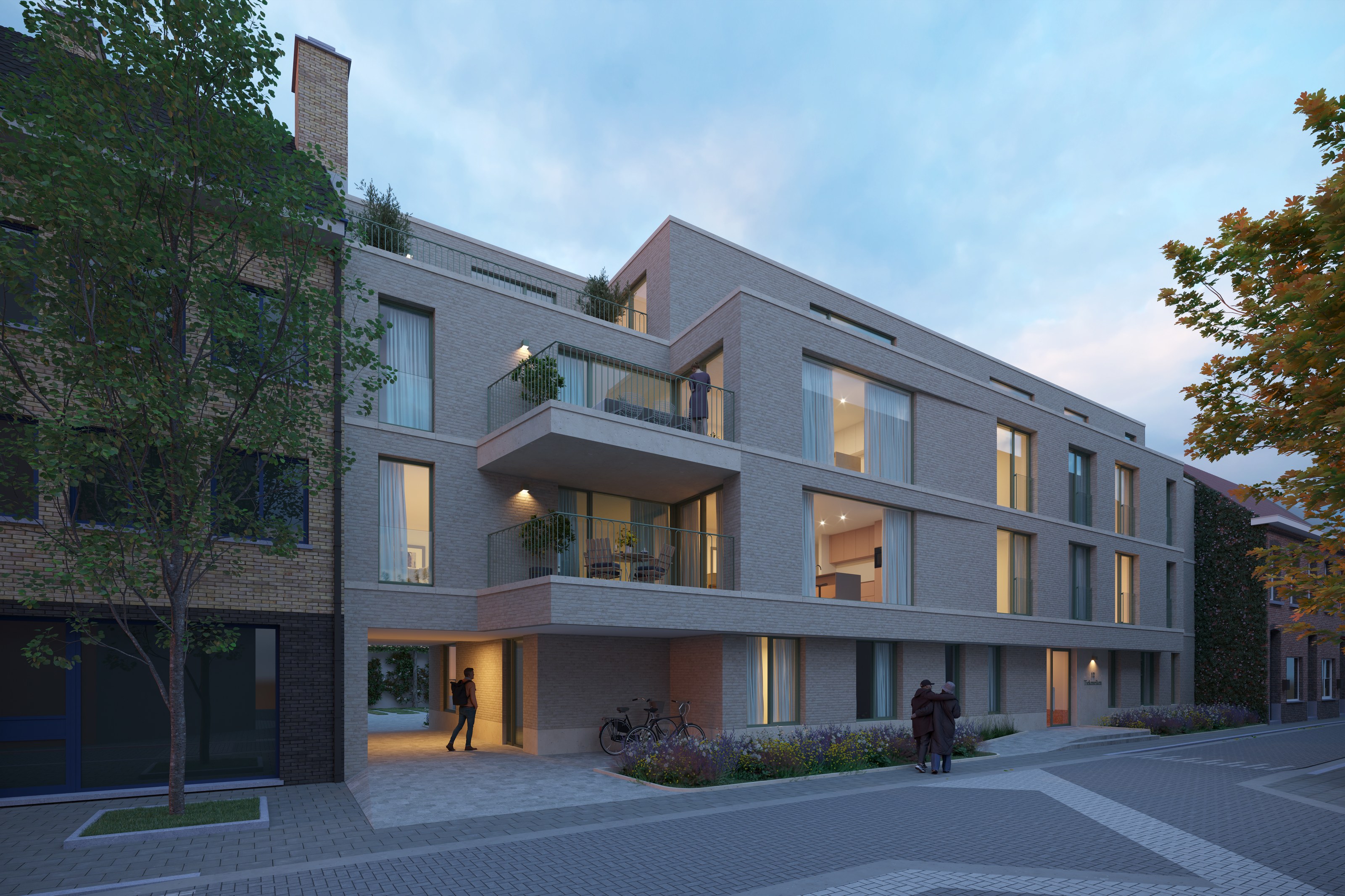 De lichte gevel van Residentie Tiekeneiken bij ochtendlicht